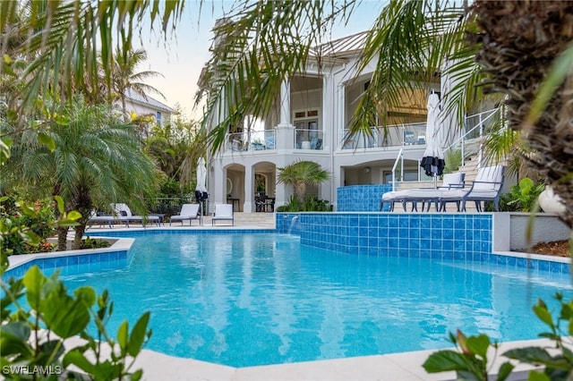 view of pool featuring pool water feature