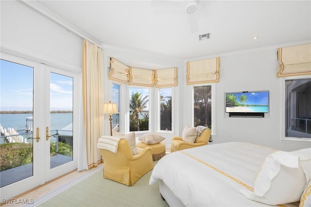 bedroom featuring a water view, french doors, access to exterior, and ceiling fan