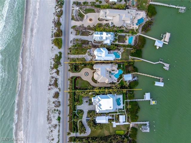 aerial view featuring a water view and a view of the beach