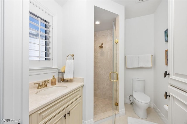 bathroom with tile patterned floors, toilet, walk in shower, and vanity