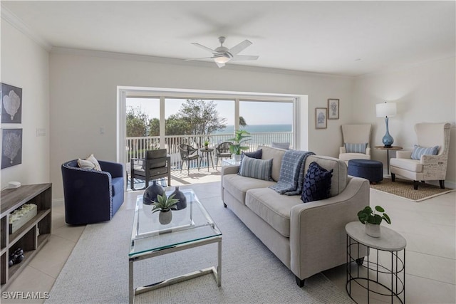 tiled living room with ornamental molding, a water view, and ceiling fan