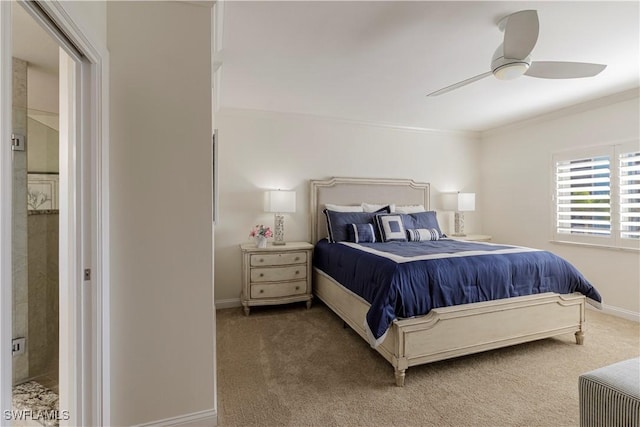 bedroom featuring crown molding, ceiling fan, and carpet flooring