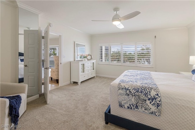 bedroom with light carpet, ornamental molding, and ceiling fan