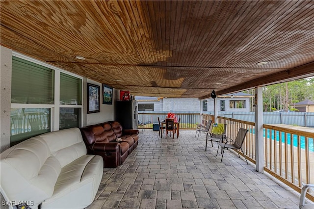 view of patio / terrace with an outdoor hangout area and a swimming pool