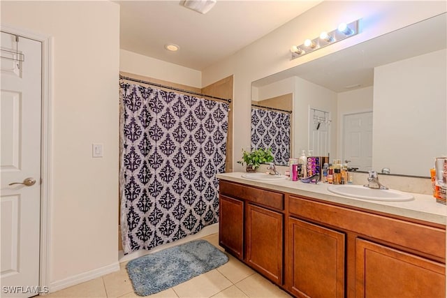 bathroom featuring vanity, tile patterned floors, and a shower with shower curtain