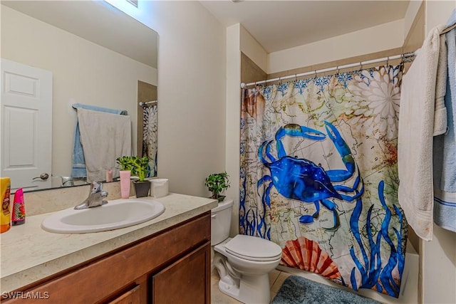 bathroom featuring toilet, vanity, and a shower with curtain