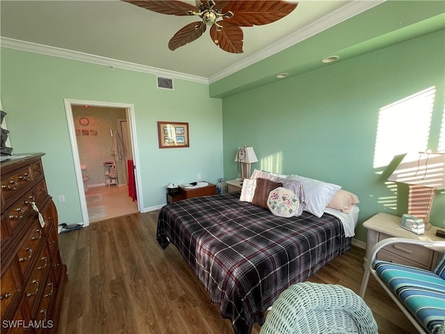 bedroom with ceiling fan, ensuite bathroom, dark hardwood / wood-style floors, and ornamental molding