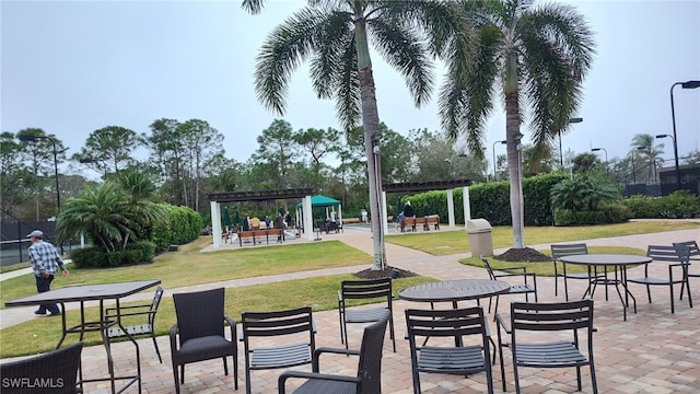 view of home's community with a lawn, a gazebo, and a pergola