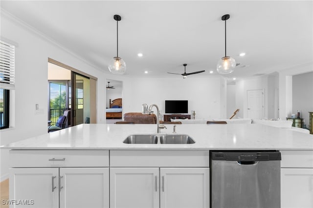 kitchen with sink, stainless steel dishwasher, and white cabinets