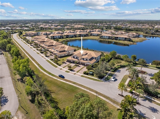 drone / aerial view featuring a water view