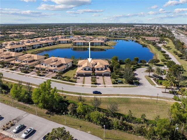 drone / aerial view with a water view