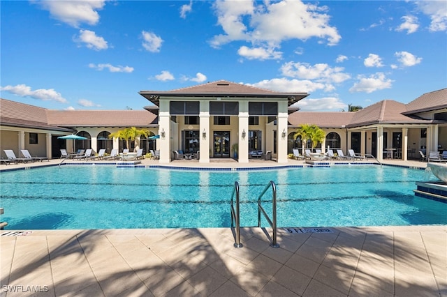 view of swimming pool featuring a patio