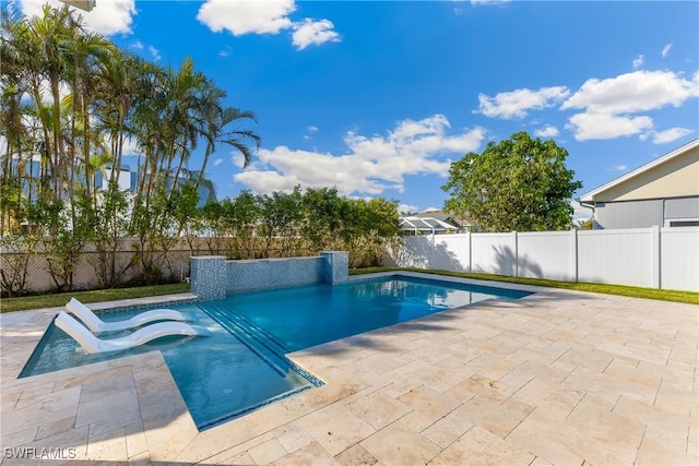 view of pool featuring a patio area