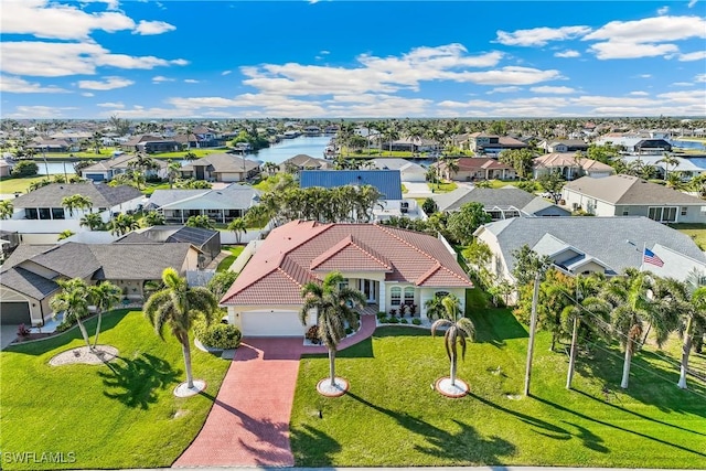 drone / aerial view featuring a water view