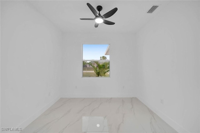 empty room featuring ceiling fan