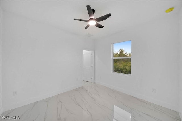 empty room featuring ceiling fan