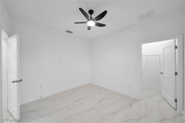 empty room with ceiling fan