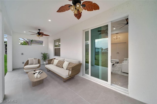 exterior space with ceiling fan