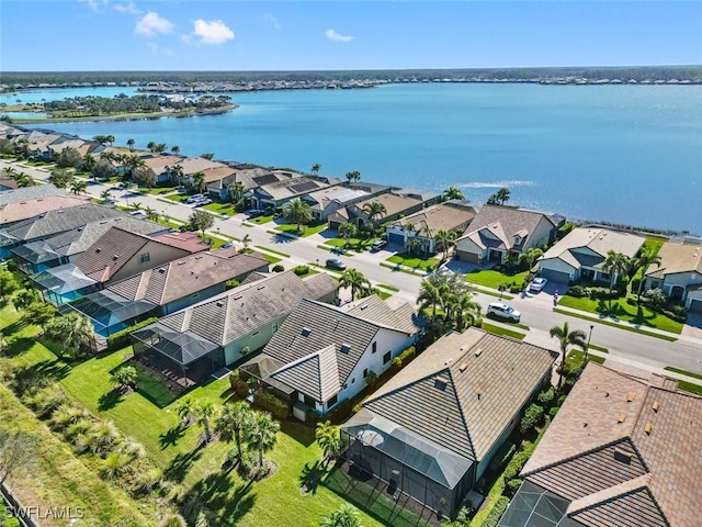 drone / aerial view with a water view