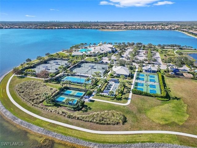 birds eye view of property with a water view