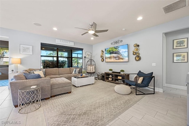 living room featuring ceiling fan