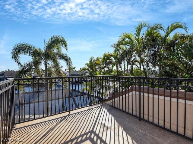 balcony featuring a water view