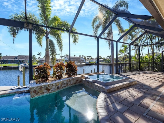 view of pool featuring an in ground hot tub, a water view, a patio, and a lanai