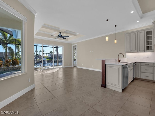 kitchen with hanging light fixtures, a water view, ornamental molding, stainless steel dishwasher, and kitchen peninsula