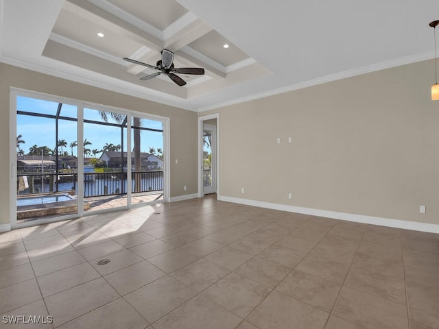 empty room featuring a water view, coffered ceiling, light tile patterned floors, and crown molding