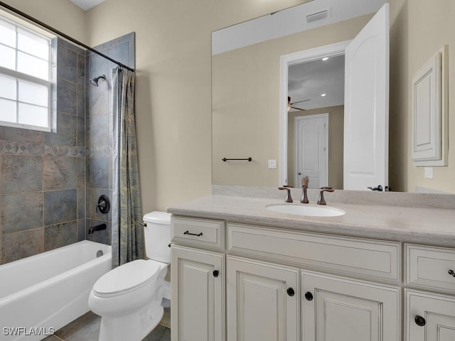 full bathroom with vanity, toilet, and shower / bath combo with shower curtain