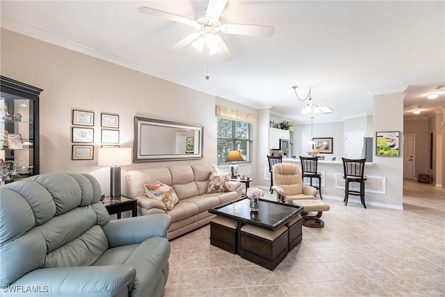 living room with ceiling fan with notable chandelier, light tile patterned floors, and crown molding