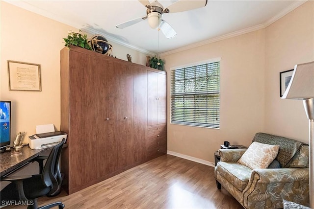 office area with ceiling fan, crown molding, and light hardwood / wood-style floors