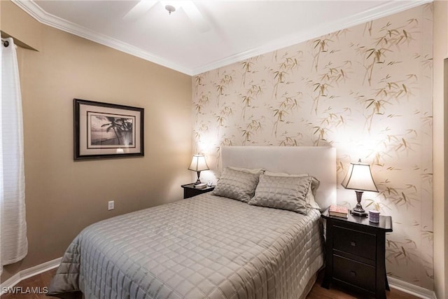 bedroom with ceiling fan, ornamental molding, and hardwood / wood-style floors