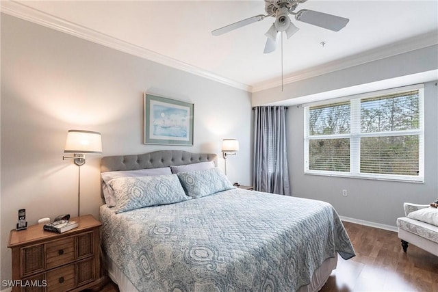 bedroom featuring ceiling fan, ornamental molding, and hardwood / wood-style floors