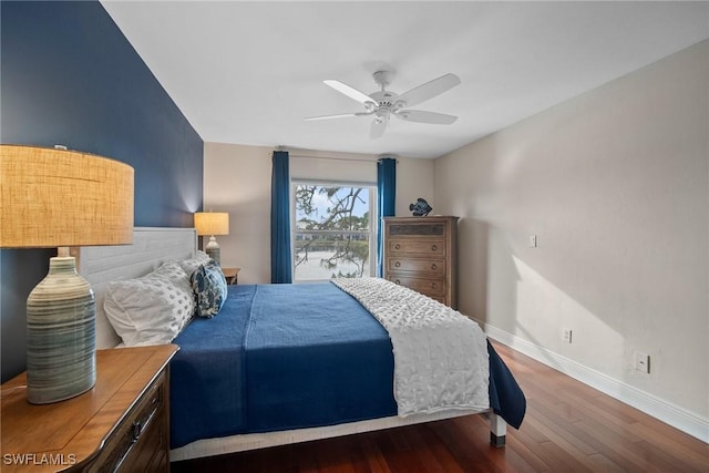 bedroom featuring ceiling fan and wood-type flooring