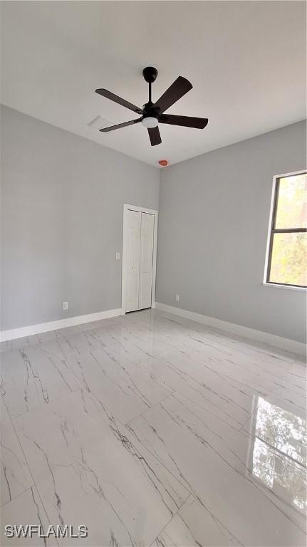 empty room with ceiling fan