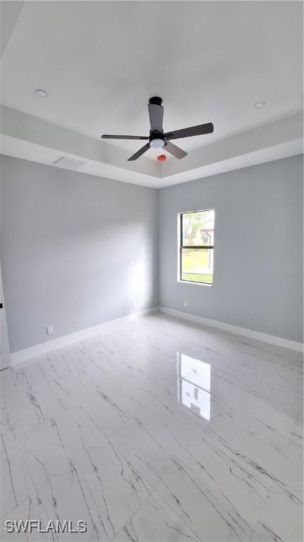 empty room featuring ceiling fan