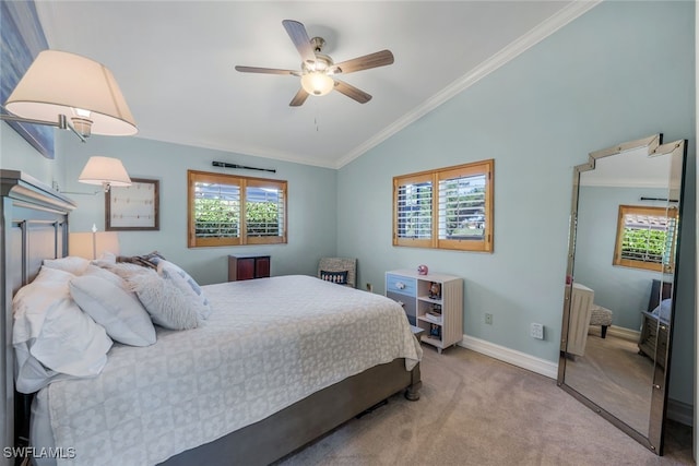 bedroom featuring crown molding, ceiling fan, vaulted ceiling, and light carpet