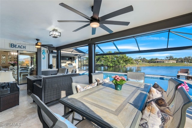 view of patio / terrace featuring a water view and outdoor lounge area