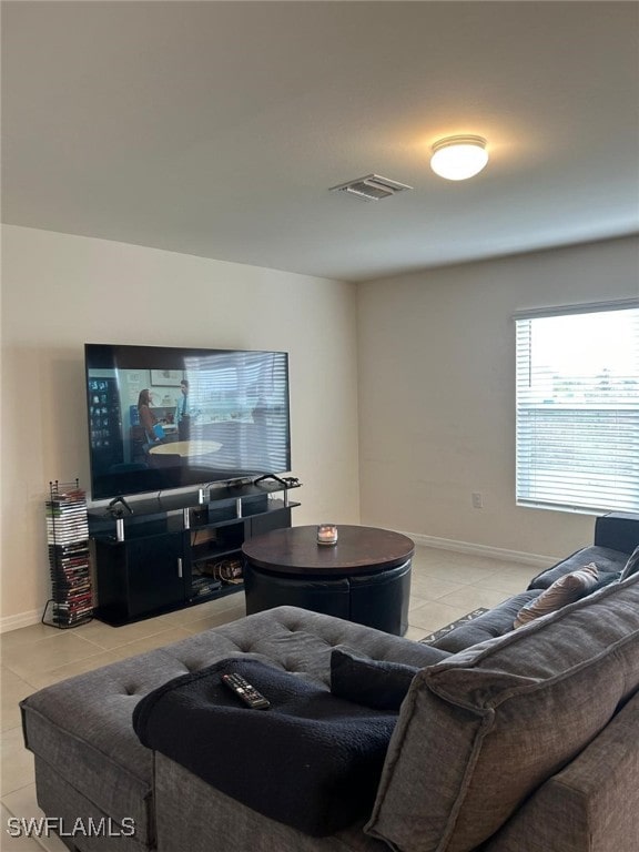 living room featuring light tile patterned flooring