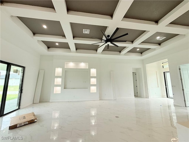 unfurnished room featuring a high ceiling, ceiling fan, coffered ceiling, and beamed ceiling