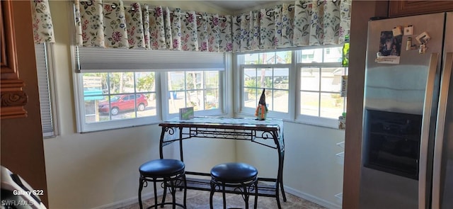 dining room featuring baseboards