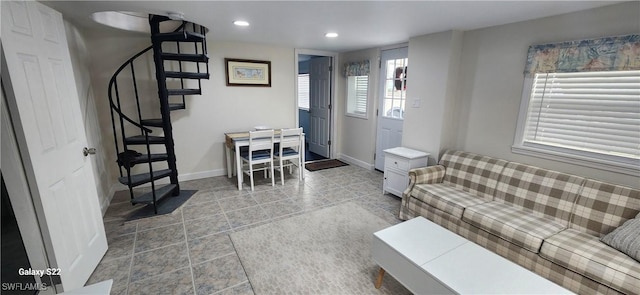 living room with stairway, recessed lighting, and baseboards
