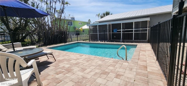 view of swimming pool with a patio, a fenced backyard, and a fenced in pool