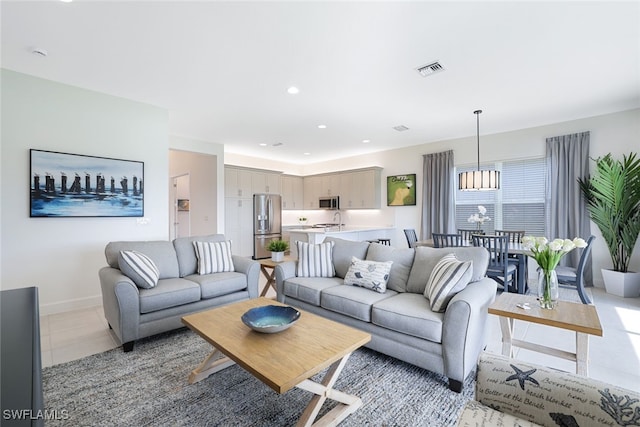 living room featuring light tile patterned floors