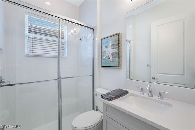 12390 Purple Ficus Way, Naples, FL 34120 - bathroom with a stall shower, toilet, and vanity