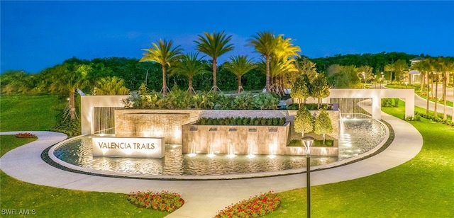 12390 Purple Ficus Way, Naples, FL 34120 - view of home's community with a lawn