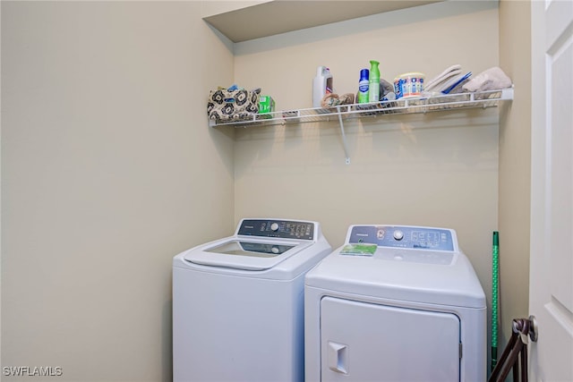 washroom featuring separate washer and dryer