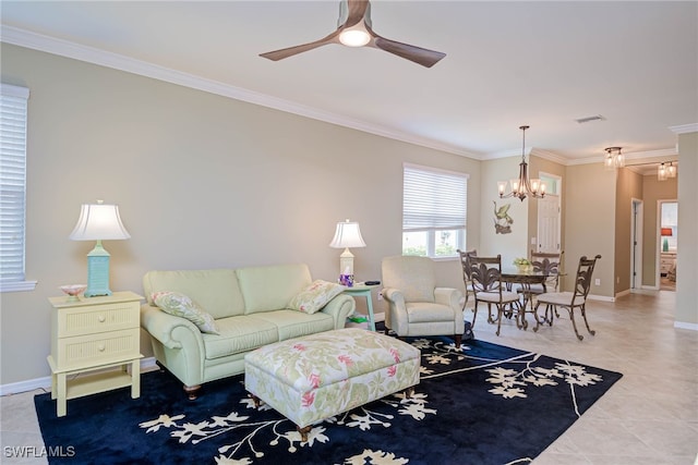 living room featuring tile patterned flooring, crown molding, and ceiling fan with notable chandelier