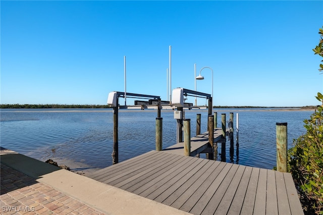 dock area featuring a water view